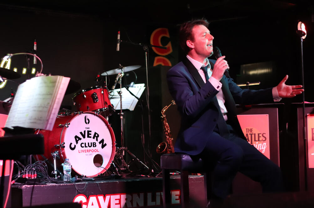 Performing at the Cavern Club, Liverpool
